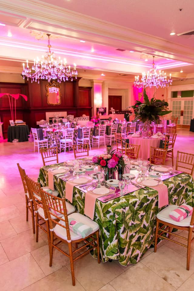 Vibrant baby shower install with balloons and florals